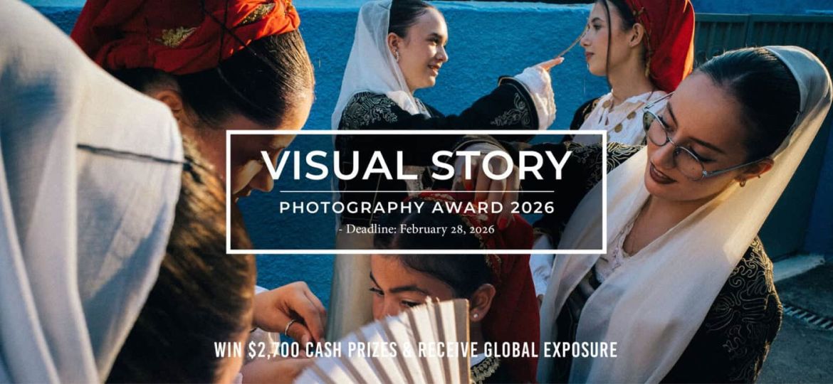Group of people in traditional attire standing together outdoors.